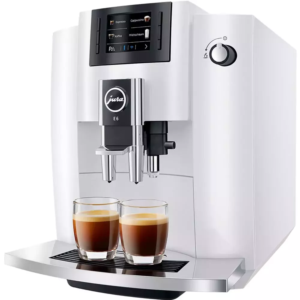 Machine à café JURA E8 vue de côté avec cafés
